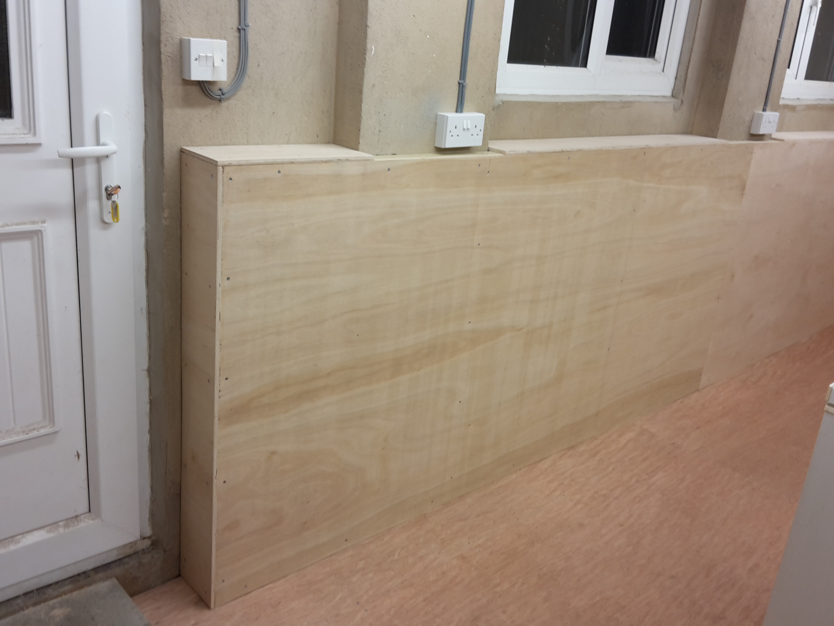 Installation Of Garage Floor/Wall Linings